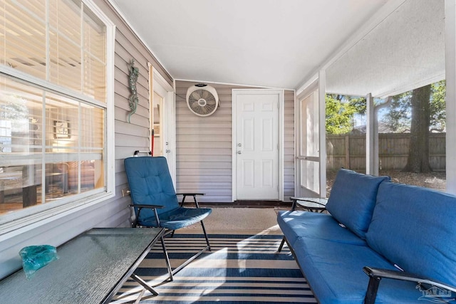 sunroom with vaulted ceiling