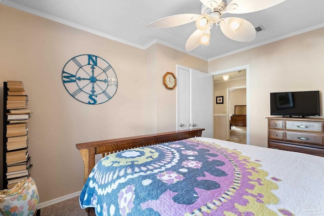 bedroom with crown molding, carpet, a textured ceiling, and ceiling fan