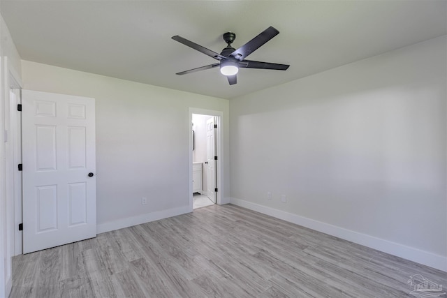 spare room with ceiling fan and light hardwood / wood-style flooring