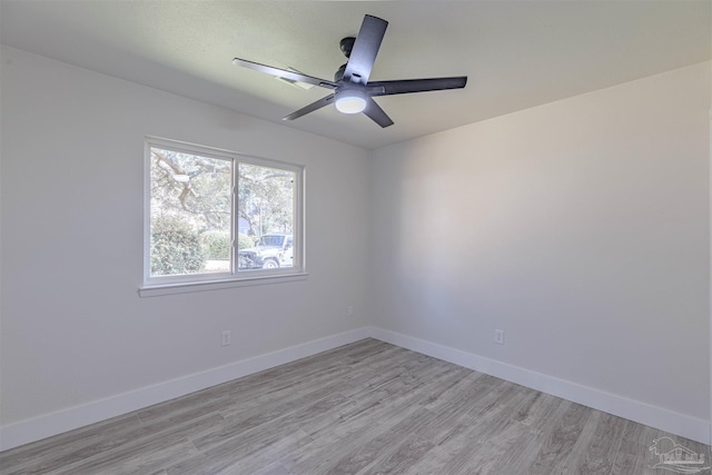 unfurnished room featuring light hardwood / wood-style floors and ceiling fan