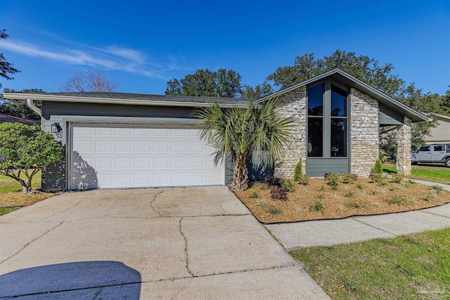 ranch-style home with a garage