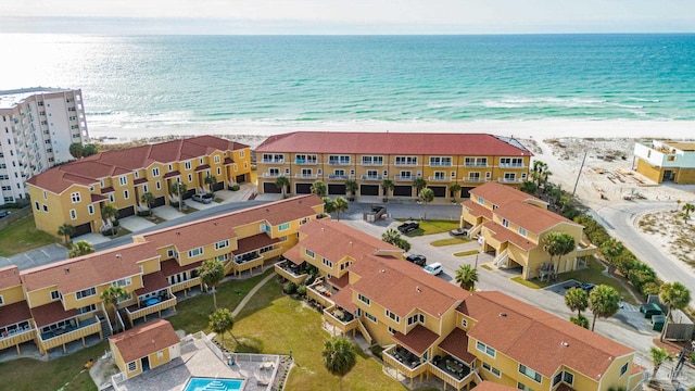 aerial view with a view of the beach and a water view