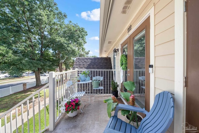 balcony featuring a porch