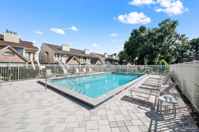 view of pool with a patio