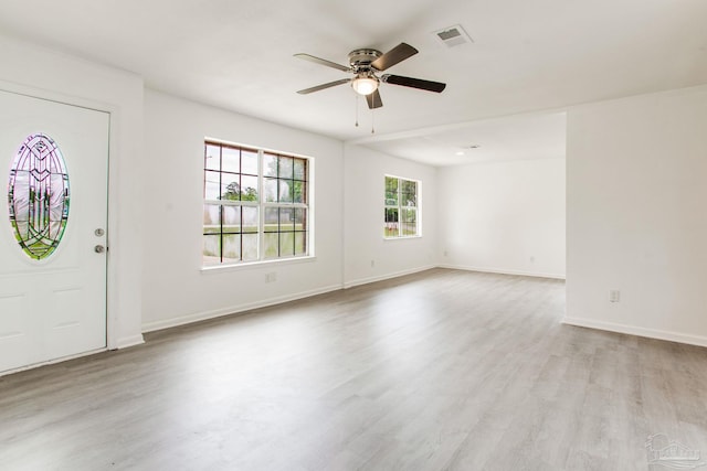 8123 Mobile Hwy, Pensacola, FL 32526 - entrance foyer featuring ceiling fan, wood finished floors, and baseboards