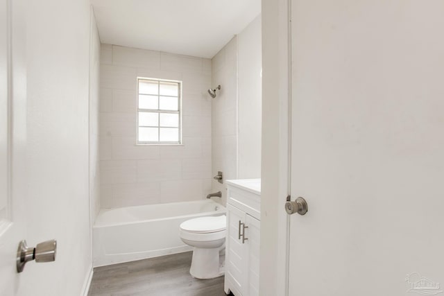 8123 Mobile Hwy, Pensacola, FL 32526 - bathroom featuring wood finished floors, toilet, vanity, and  shower combination