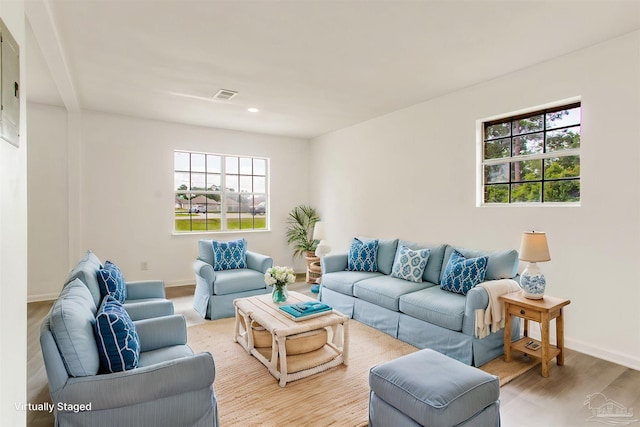 8123 Mobile Hwy, Pensacola, FL 32526 - living room featuring wood finished floors, baseboards, and recessed lighting