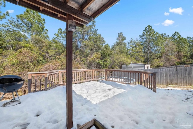 wooden terrace with grilling area