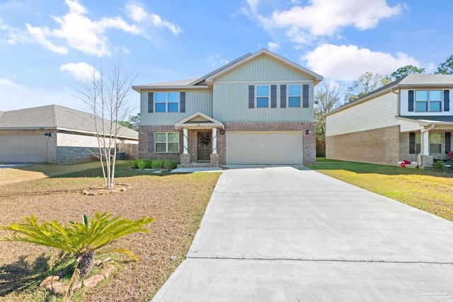 view of front of property featuring a front lawn and a garage