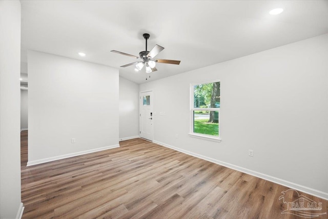 5621 Kingery Rd, Milton, FL 32583 - spare room featuring wood finished floors, ceiling fan, baseboards, and recessed lighting