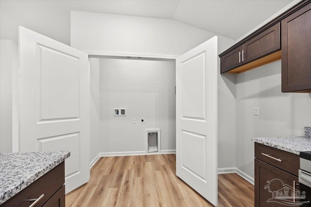 5621 Kingery Rd, Milton, FL 32583 - laundry area with electric dryer hookup, light wood finished floors, hookup for a washing machine, and baseboards