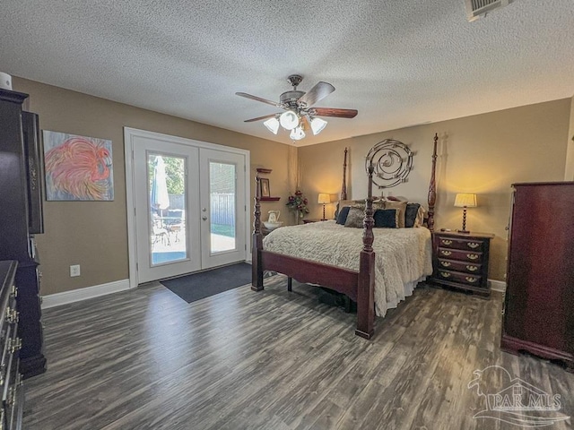 bedroom with dark wood-type flooring, french doors, ceiling fan, access to exterior, and a textured ceiling