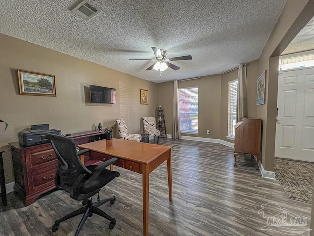 office area with dark hardwood / wood-style floors, ceiling fan, and a textured ceiling