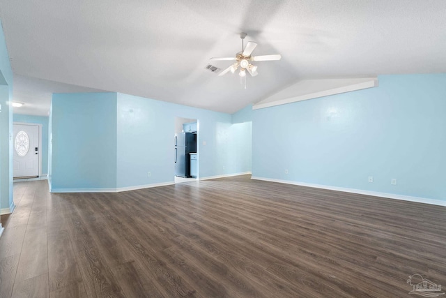 unfurnished living room with dark hardwood / wood-style flooring, vaulted ceiling, and ceiling fan