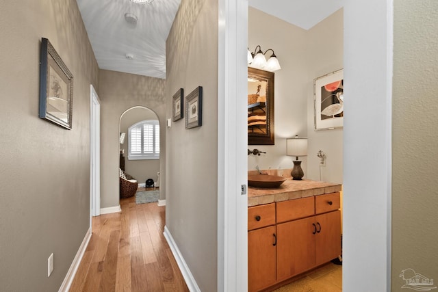 hallway with light wood-type flooring