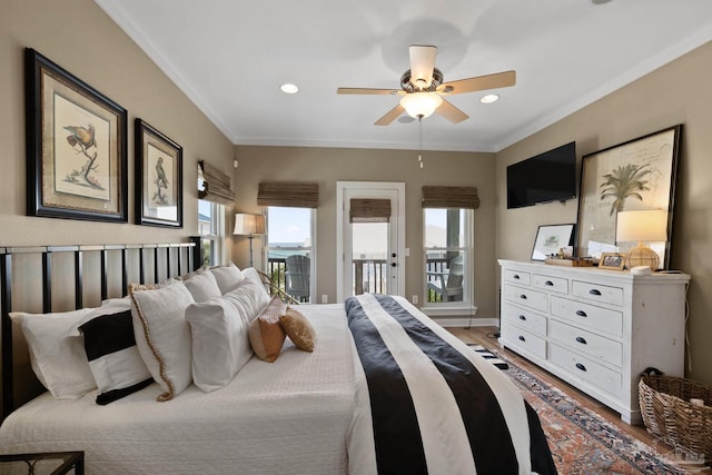 bedroom with ceiling fan, access to exterior, ornamental molding, and hardwood / wood-style flooring