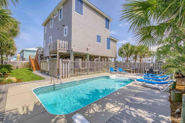 view of swimming pool featuring a patio