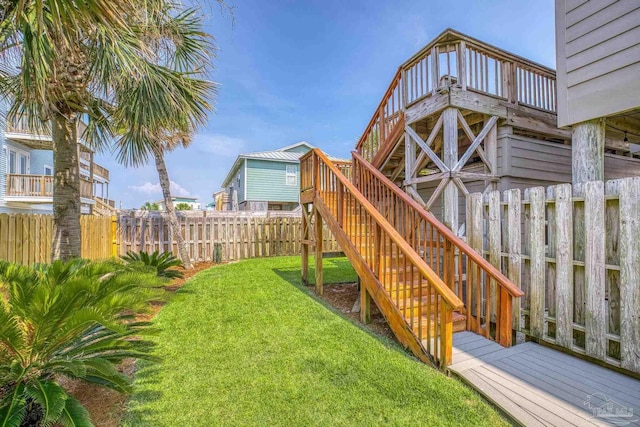 view of yard with a wooden deck