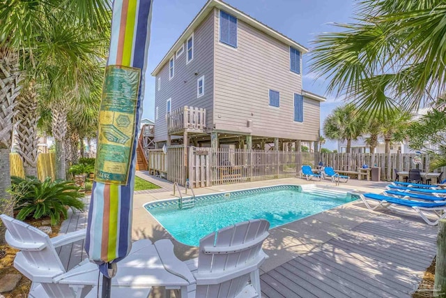 view of swimming pool featuring a patio