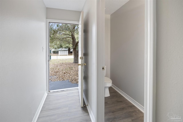 32 Enchanted Way, Santa Rosa Beach, FL 32459 - doorway featuring wood finished floors and baseboards