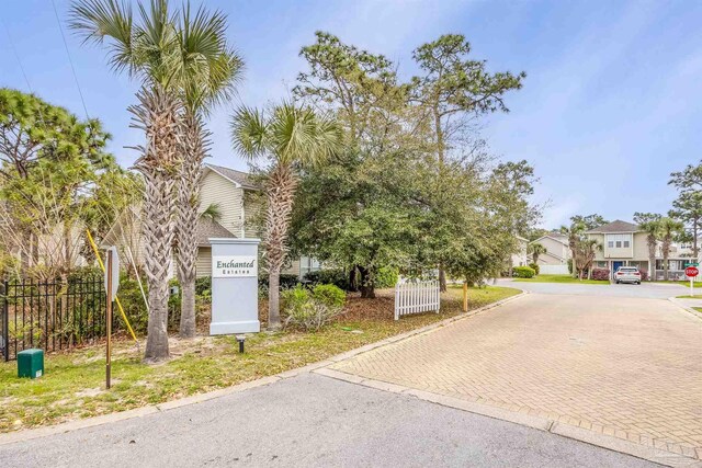 32 Enchanted Way, Santa Rosa Beach, FL 32459 - view of front facade featuring a residential view and decorative driveway