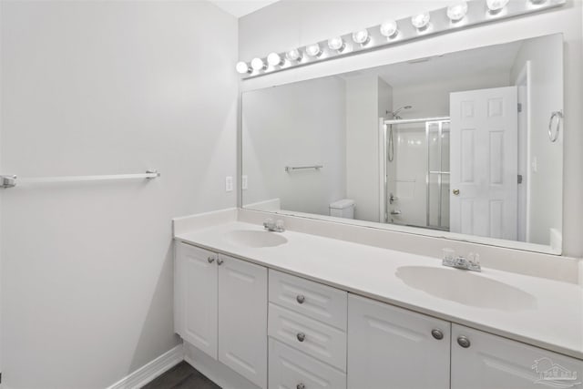32 Enchanted Way, Santa Rosa Beach, FL 32459 - full bath featuring a stall shower, double vanity, and toilet