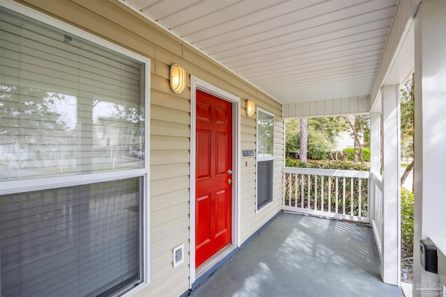 32 Enchanted Way, Santa Rosa Beach, FL 32459 - view of exterior entry with a porch