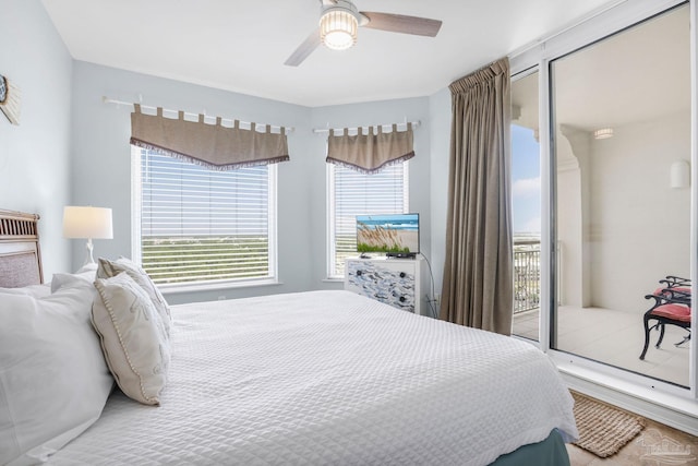 bedroom with ceiling fan and access to outside