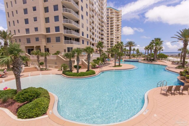 pool featuring a patio area