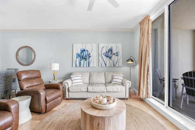 living area featuring ceiling fan and ornamental molding