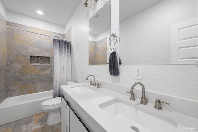 full bathroom featuring toilet, visible vents, shower / bath combo, and a sink