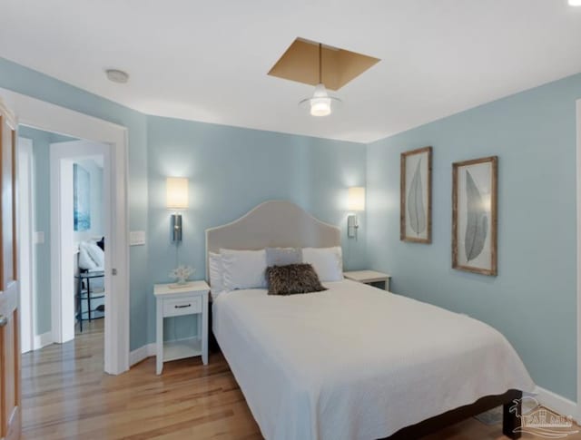 bedroom featuring light wood-type flooring