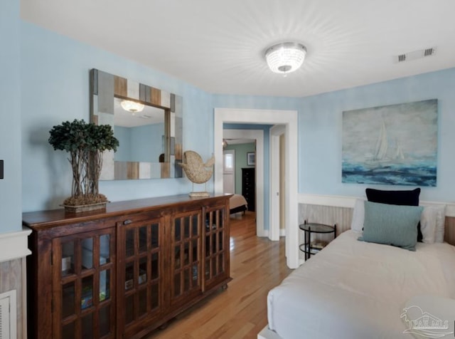 bedroom featuring wood-type flooring