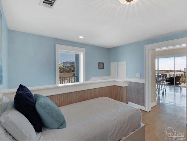 bedroom with light wood-type flooring