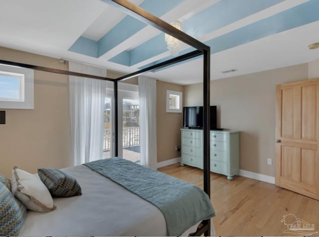 bedroom with light hardwood / wood-style flooring