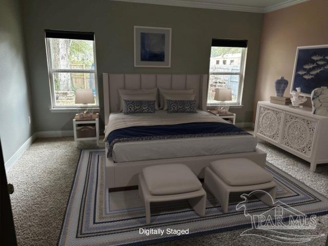 bedroom with multiple windows, ornamental molding, and carpet