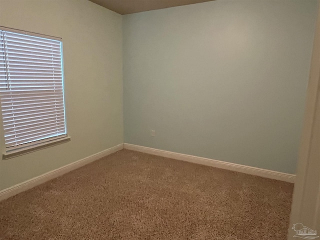 view of carpeted spare room