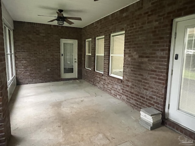 view of patio / terrace featuring ceiling fan