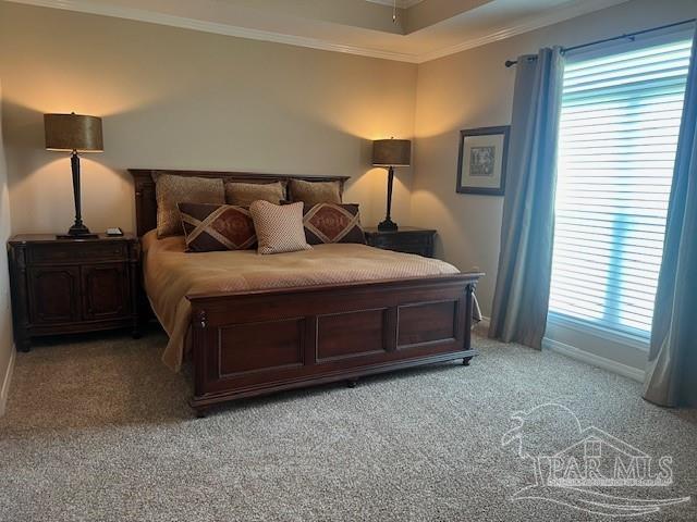 bedroom featuring light carpet and ornamental molding