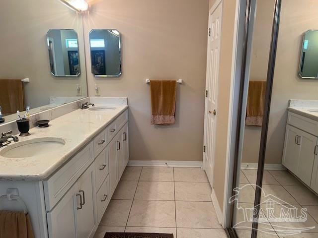 bathroom featuring vanity and tile patterned floors