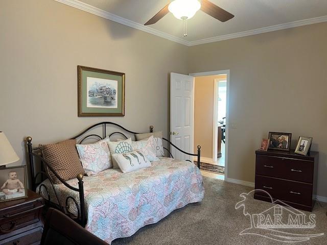 carpeted bedroom with crown molding