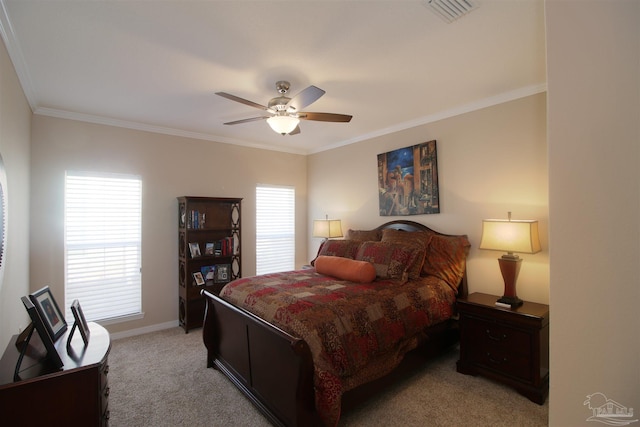 carpeted bedroom featuring ornamental molding and ceiling fan