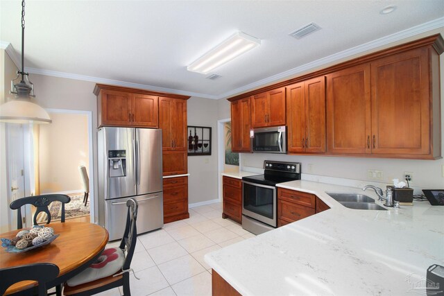 kitchen featuring sink, crown molding, and stainless steel appliances