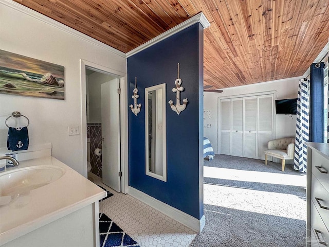 bathroom with vanity, wood ceiling, and ornamental molding