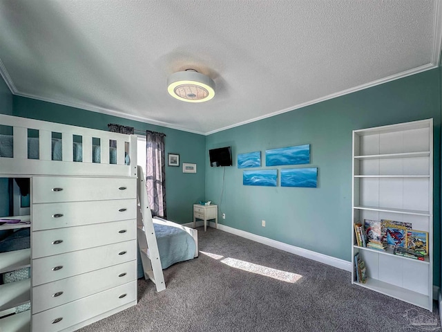 carpeted bedroom with ornamental molding and a textured ceiling