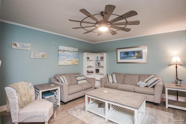 living room with ceiling fan, wood-type flooring, and crown molding