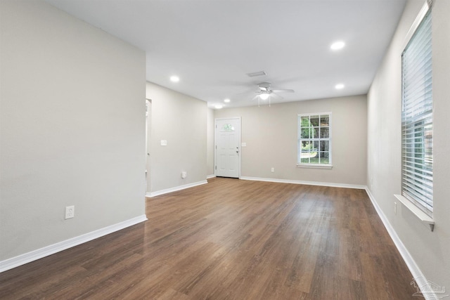 1010 W Lloyd St, Pensacola, FL 32501 - empty room featuring a ceiling fan, recessed lighting, wood finished floors, and baseboards