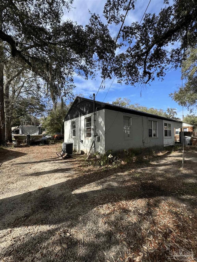 5233 Admiral Halsey Rd, Milton, FL 32583 - view of side of property with cooling unit