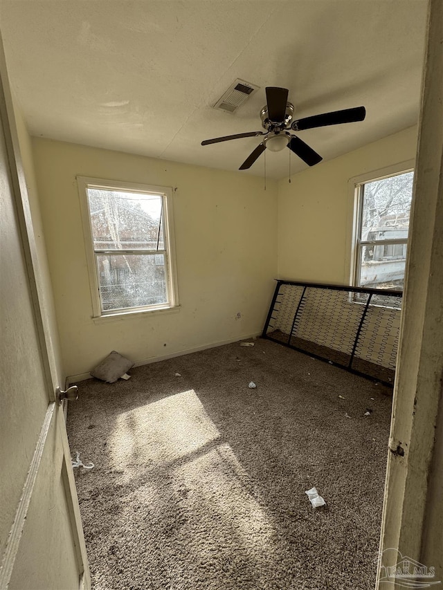 5233 Admiral Halsey Rd, Milton, FL 32583 - carpeted empty room with a ceiling fan