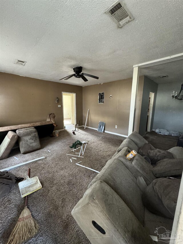 5233 Admiral Halsey Rd, Milton, FL 32583 - carpeted living room featuring ceiling fan, a textured ceiling, and baseboards